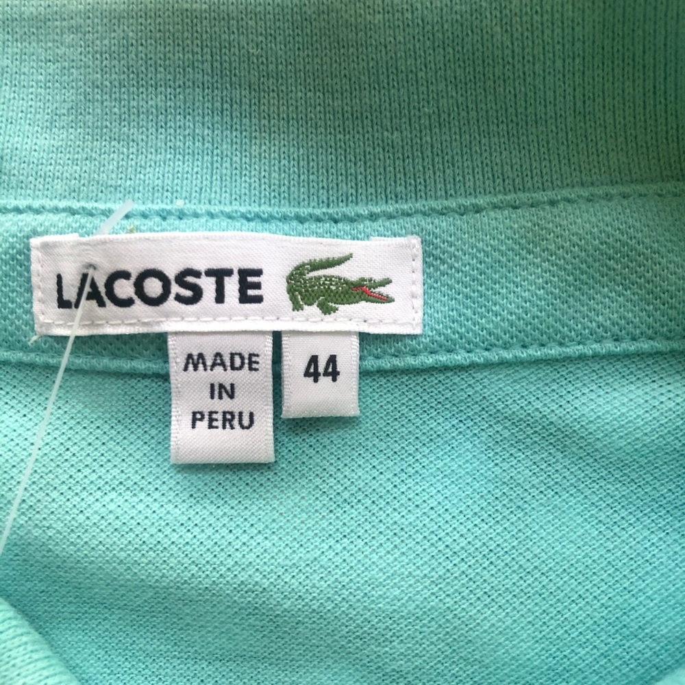 Pristine soft teal scalloped hem detailed placket